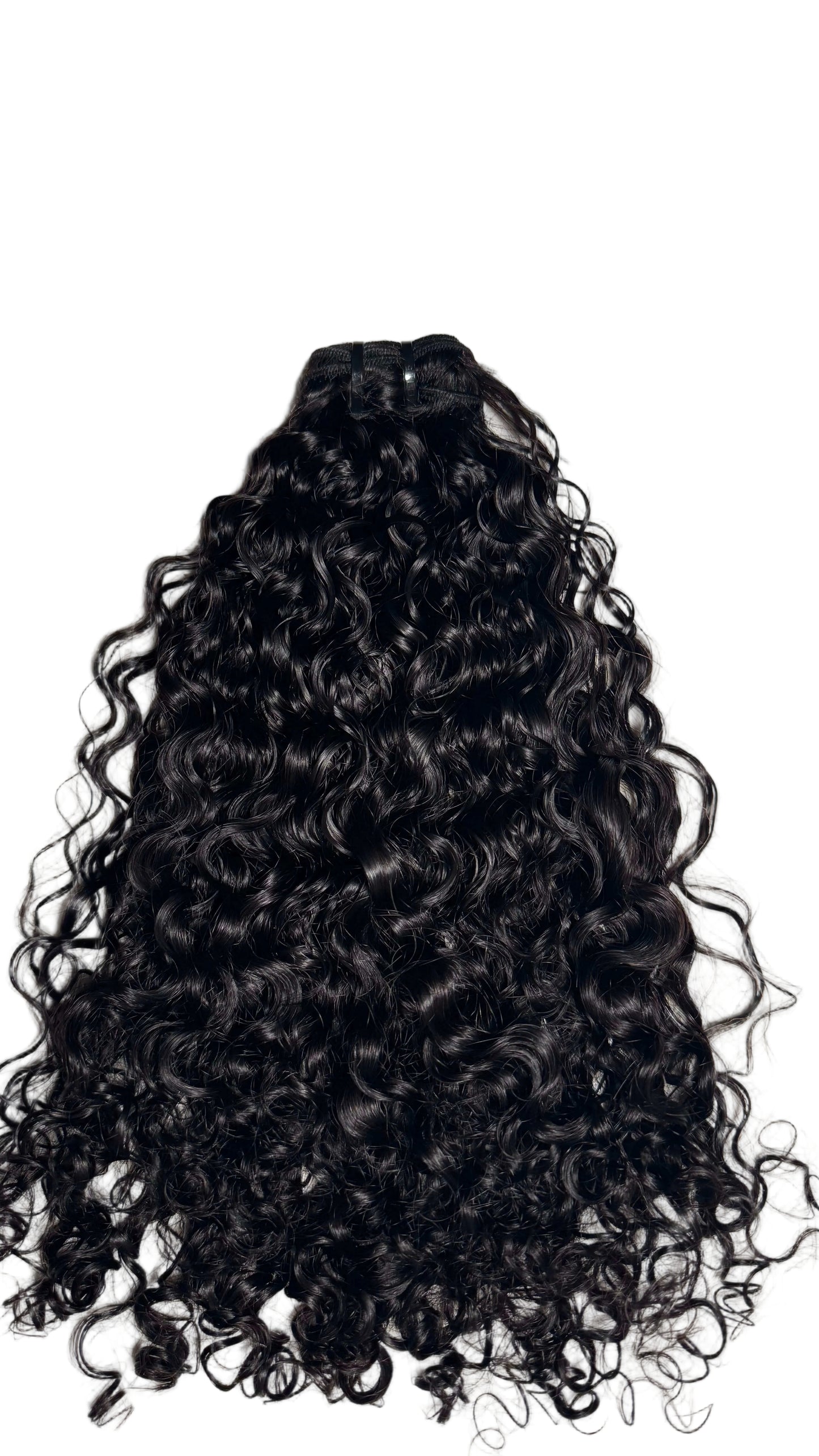 Black curly hair extensions on a textured white background