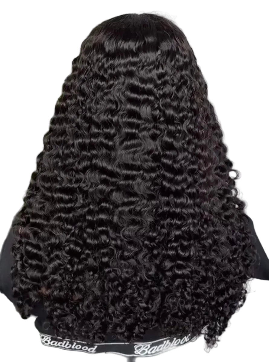 Burmese half wig styled on a person, against a neutral background.